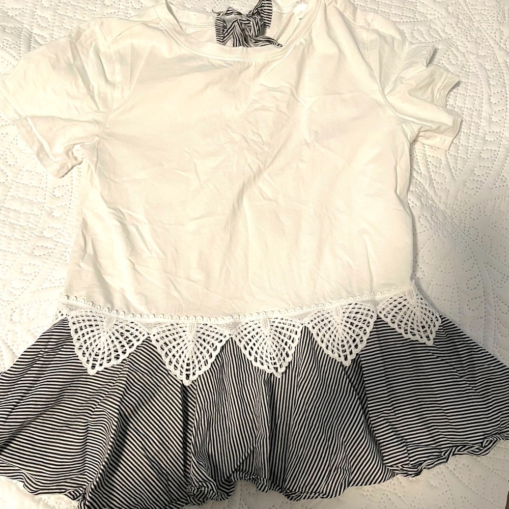 White top with ruffles detail